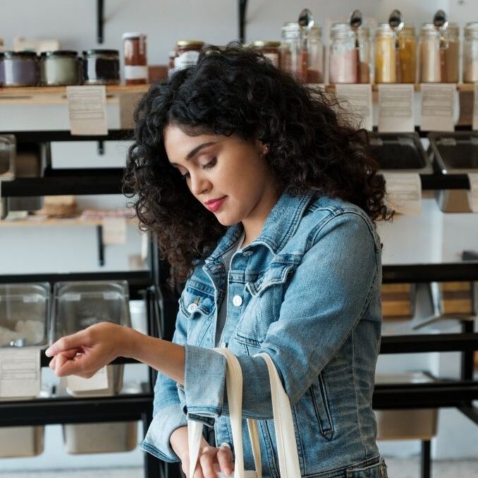 Woman shopping in a zero waste store