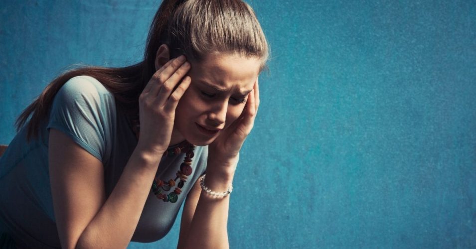 Crying Expert Advice Social Size A woman crying at work.