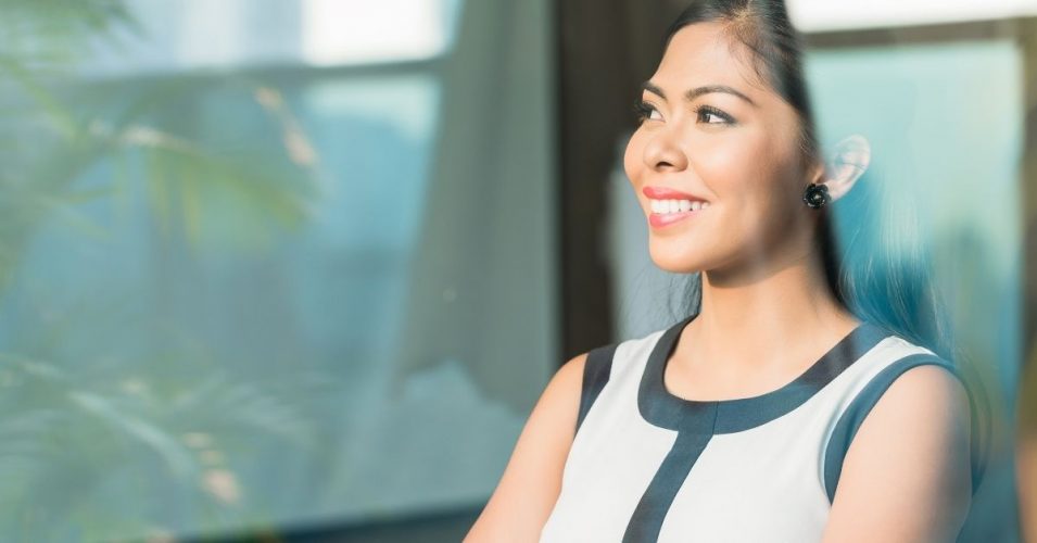 Jivi Saran Expert Advice Social Size Woman leader thinking and smiling